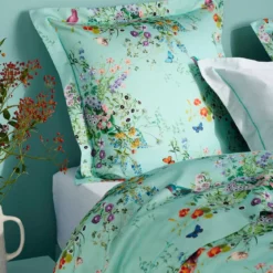 Drap plat satin de coton 115 g/m² imprimé bleu vert Le printemps azur