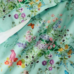 Drap plat satin de coton 115 g/m² imprimé bleu vert Le printemps azur