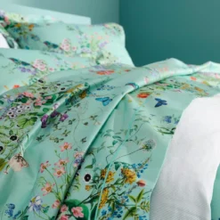 Drap plat satin de coton 115 g/m² imprimé bleu vert Le printemps azur