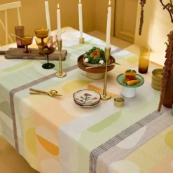 Nappe pur coton enduit 205 g/m² motif jacquard vert orange Mille galets terre cuite