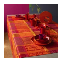 Nappe pur coton enduit motif jacquard orange rouge Mille wax ketchup
