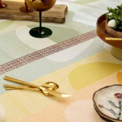Nappe pur coton 205 g/m² motif jacquard vert orange Mille galets terre cuite