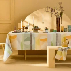 Nappe pur coton 205 g/m² motif jacquard vert orange Mille galets terre cuite