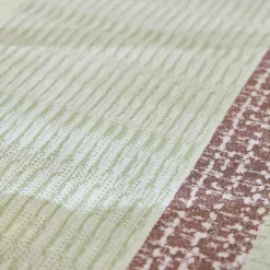 Nappe pur coton 205 g/m² motif jacquard vert orange Mille galets terre cuite