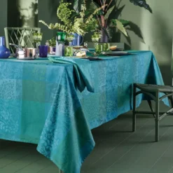 Nappe sur mesure pur coton enduit motif jacquard vert Mille rameaux emeraude