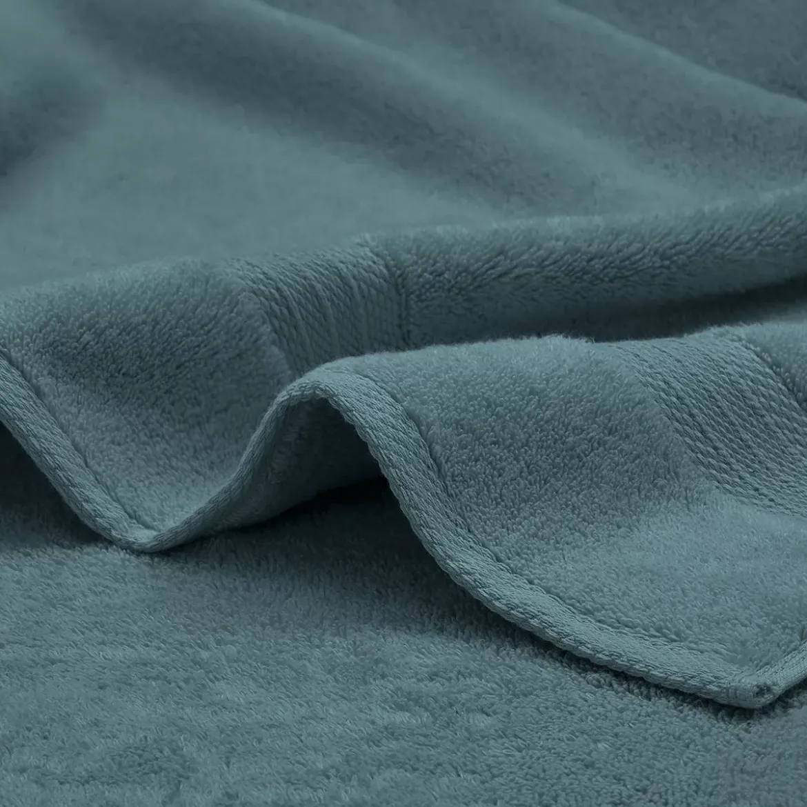Serviette eponge pur coton 550 g/m² uni bleu Elea petrole