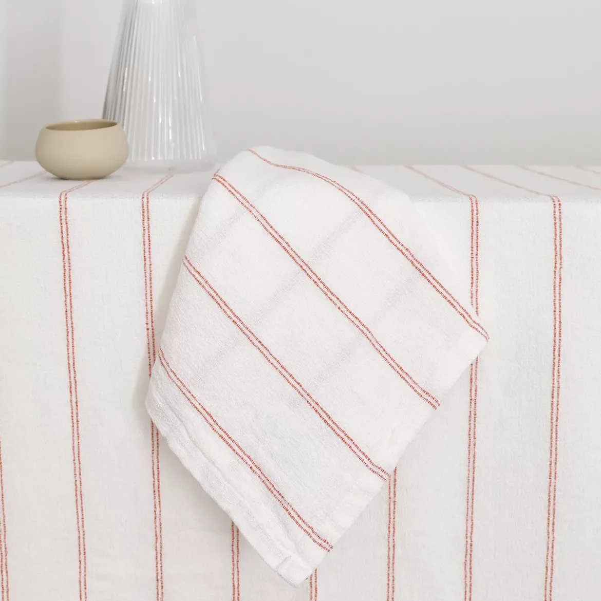 Serviette pur coton lavé motif jacquard orange blanc Rimini terracotta