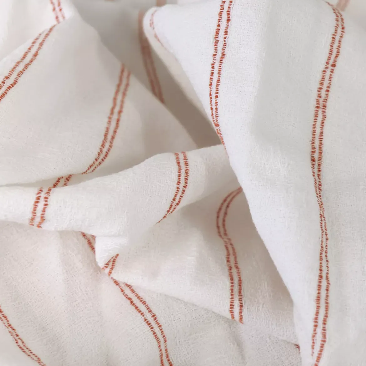 Serviette pur coton lavé motif jacquard orange blanc Rimini terracotta