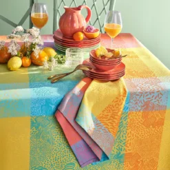 Serviette pur coton motif jacquard bleu jaune orange Mille vagues exotique