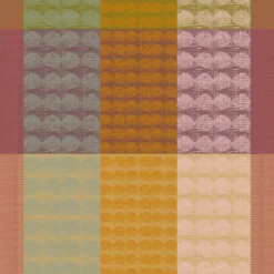 Serviette pur coton motif jacquard vert orange Mille halos prunus