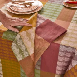 Serviette pur coton motif jacquard vert orange Mille halos prunus