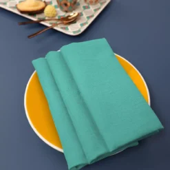 Serviette pur coton motif jacquard canard Bastide turquoise