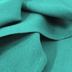 Serviette pur coton motif jacquard canard Bastide turquoise