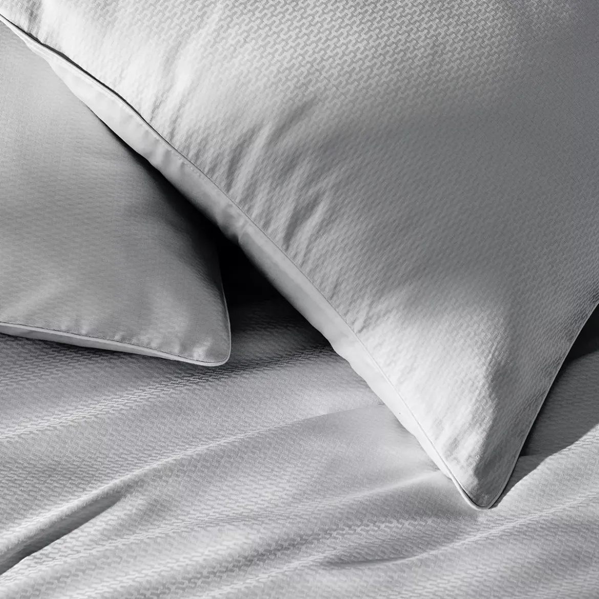 Taie d'oreiller satin de coton motif jacquard gris Vibrato glacier