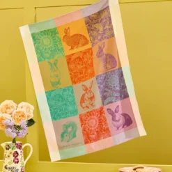 Torchon pur coton motif jacquard bleu rose Les lapins printemps