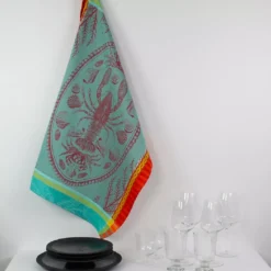 Torchon pur coton motif jacquard multicolore Maree basse lagon